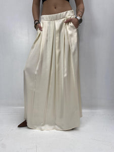 Gonna in raso con pieghe