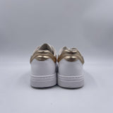 Sneakers tennis in pelle con dettagli metallizzati