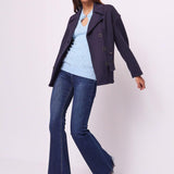 Jeans flare con mini tasche