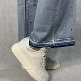 Jeans vita alta e gamba larga con strass