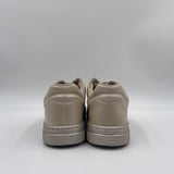 Sneakers in pelle con logo a contrasto