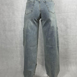 Jeans vita con tascone sulla gamba