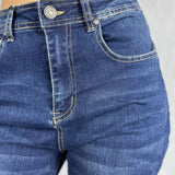 Jeans vita alta e gamba dritta con risvolto