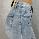 Jeans vita alta e gamba larga con strass