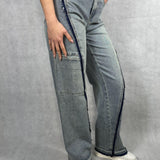 Jeans vita con tascone sulla gamba