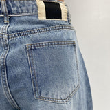 Jeans vita alta e gamba larga