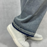 Jeans vita con tascone sulla gamba