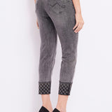 Jeans skinny con risvolto