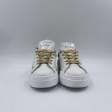 Sneakers con lacci oro