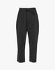 Pantalone con pieghe