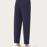 Pantalone carrot gessato con pinces