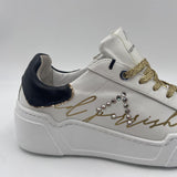Sneakers con lacci oro